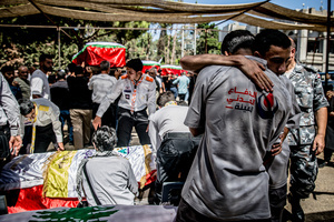 (EDITORS NOTE: Image depicts death)
Mourners console each other in Kfar Roummane, southern Lebanon, during the funeral of a family killed by an Israeli airstrike. At least 4,381 people were killed and 12,402 wounded by Israeli attacks in Lebanon between March 2 and September 7, 2026, according to Lebanon's ministry of health.