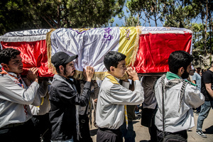 Mourners carry a coffin in Kfar Roummane, southern Lebanon, during the funeral of a family killed by an Israeli airstrike. At least 4,381 people were killed and 12,402 wounded by Israeli attacks in Lebanon between March 2 and September 7, 2026, according to Lebanon's ministry of health.