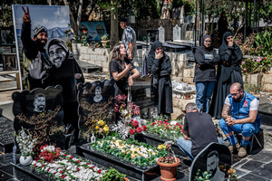 Mourners at a cemetery in Kfar Roummane, southern Lebanon, during the funeral of a family killed by an Israeli airstrike. At least 4,381 people were killed and 12,402 wounded by Israeli attacks in Lebanon between March 2 and September 7, 2026, according to Lebanon's ministry of health.