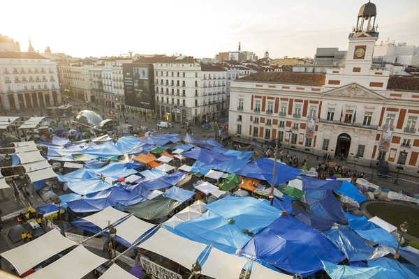 View of tents of Hundreds of protesters during a protest at Puerta del Sol square. Housing protest camp against the high cost of housing and rent. The protest arose following the eviction of an 87-year-old woman, María del Carmen Abascal, commonly known as “Maricarmen” from her apartment.