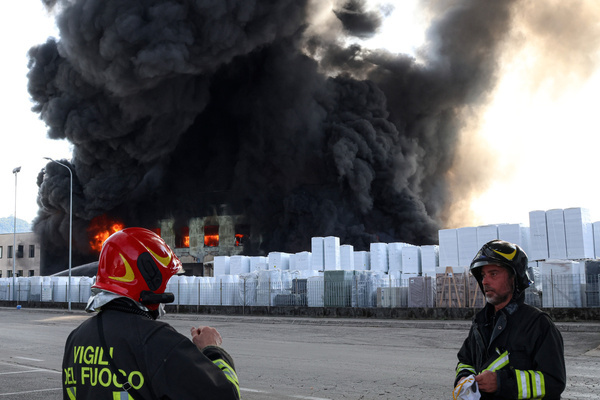 Firefighters prepare to tackle a major fire at the Nuova Deroma facility as towering flames and dense black smoke engulf the site triggering an emergency operation. A major warehouse fire broke out at Azienda Nuova Deroma in Maol, and there are no injuries reported.
