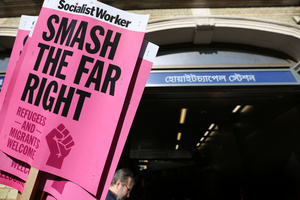 A placard saying ‘smash the far right’ seen during the rally. The 90th anniversary of the Battle of Cable Street is commemorated on Sunday 4 October 2026 in the east end of London. Despite the make-up having changed greatly over the last nine decades, thousands still marched through the streets to oppose Fascism and Zionism. In 1936, over 100,000 Jewish residents, Irish dockers, trade unionists, and local working-class communities stood shoulder to shoulder and repelled Sir Oswald Mosley's British Union of Fascists.