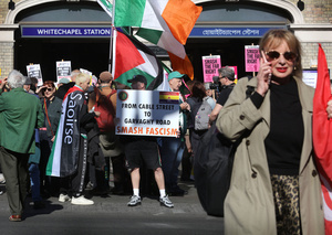 An Irish Republican supporter seen holding a sign saying ‘From Cable Street To Garvaghy Road, Smash Fascism’ outside Whitechapel tube station during the rally. The 90th anniversary of the Battle of Cable Street is commemorated on Sunday 4 October 2026 in the east end of London. Despite the make-up having changed greatly over the last nine decades, thousands still marched through the streets to oppose Fascism and Zionism. In 1936, over 100,000 Jewish residents, Irish dockers, trade unionists, and local working-class communities stood shoulder to shoulder and repelled Sir Oswald Mosley's British Union of Fascists.