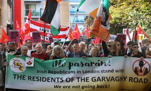 Member of parliament, John McDonnell (third left) and Sinn Fein national Chairman, Declan Kearney (centre) seen marching behind an Irish Republican banner during the rally. The 90th anniversary of the Battle of Cable Street is commemorated on Sunday 4 October 2026 in the east end of London. Despite the make-up having changed greatly over the last nine decades, thousands still marched through the streets to oppose Fascism and Zionism. In 1936, over 100,000 Jewish residents, Irish dockers, trade unionists, and local working-class communities stood shoulder to shoulder and repelled Sir Oswald Mosley's British Union of Fascists.