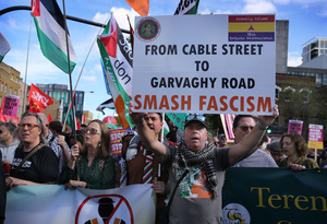 An Irish Republican supporter seen holding a sign saying ‘From Cable Street To Garvaghy Road, Smash Fascism’ during the rally. The 90th anniversary of the Battle of Cable Street is commemorated on Sunday 4 October 2026 in the east end of London. Despite the make-up having changed greatly over the last nine decades, thousands still marched through the streets to oppose Fascism and Zionism. In 1936, over 100,000 Jewish residents, Irish dockers, trade unionists, and local working-class communities stood shoulder to shoulder and repelled Sir Oswald Mosley's British Union of Fascists.