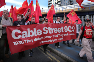 Supporters of the communist party seen chanting slogans while holding red banner and flags during the march along Cable Street . The 90th anniversary of the Battle of Cable Street is commemorated on Sunday 4 October 2026 in the east end of London. Despite the make-up having changed greatly over the last nine decades, thousands still marched through the streets to oppose Fascism and Zionism. In 1936, over 100,000 Jewish residents, Irish dockers, trade unionists, and local working-class communities stood shoulder to shoulder and repelled Sir Oswald Mosley's British Union of Fascists.
