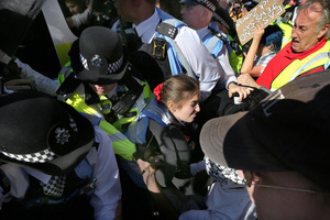 A police officer seen tussling with protesters who try to prevent the arrest of a colleague during the rally. The 90th anniversary of the Battle of Cable Street is commemorated on Sunday 4 October 2026 in the east end of London. Despite the make-up having changed greatly over the last nine decades, thousands still marched through the streets to oppose Fascism and Zionism. In 1936, over 100,000 Jewish residents, Irish dockers, trade unionists, and local working-class communities stood shoulder to shoulder and repelled Sir Oswald Mosley's British Union of Fascists.