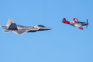Two military fighter jets perform over the skies of San Francisco. Crowds gather along the waterfront to watch the San Francisco Fleet Week Air Show as aircraft, including the U.S. Navy Blue Angels, performed in the skies over the city. The annual event is part of San Francisco Fleet Week, which celebrates the U.S. military and honors the men and women serving in the armed forces.