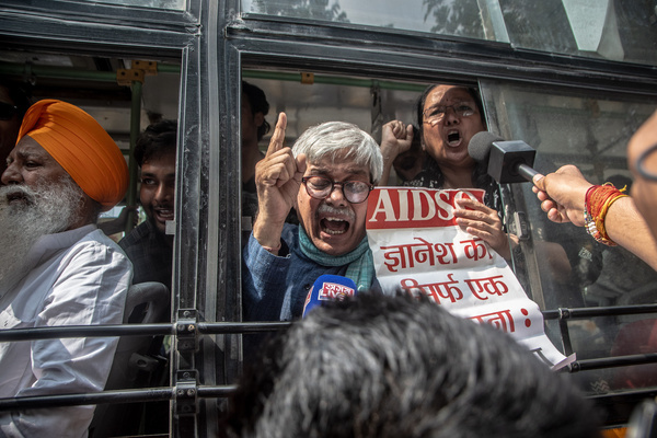 Protesters continue chanting from inside a police vehicle after being detained during a demonstration organised by the Cockroach Janta Party (CJP) in New Delhi. Demonstrators demanded the resignation of Chief Election Commissioner Gyanesh Kumar over alleged electoral roll irregularities. Ajinkya Shinde, national organisation in-charge of the Cockroach Janta Party (CJP) announced a protest in different cities against the detention of leaders and protestors in Delhi and across the country who are demanding the resignation of Gyanesh Kumar, Chief Election Commissioner (CEC) of India over allegations of voter list manipulation during the verification of country's voter population under Special Intensive Revision (SIR).