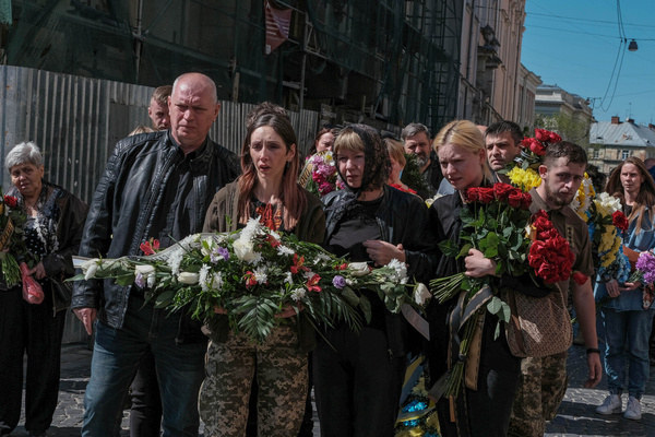 The family and friends of Ukrainian soldier, Senior Sergeant Oleksandr Oleksandrovych Moiseyenko, killed in Popasna in Luhansk look on as his coffin is transferred to a waiting vehicle in Lviv. Russia invaded Ukraine on 24 February 2022, triggering the largest military attack in Europe since World War II.