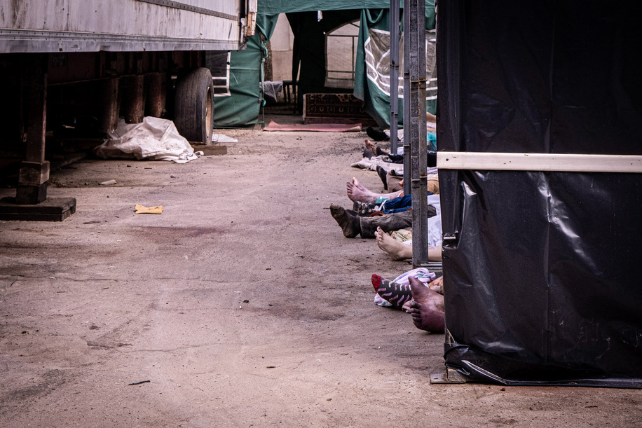 (EDITORS NOTE: Image depicts death)
Feet of civilian corpses are seen in an outdoor area in a morgue in Kharkiv. As the war in Ukraine continued to rage, killing numerous civilians and soldiers, morgues were full of the deceased as there was no space to hold or process them. According to the United Nations, over 3,280 civilians were killed and 3,451 wounded in the past two months of the war.