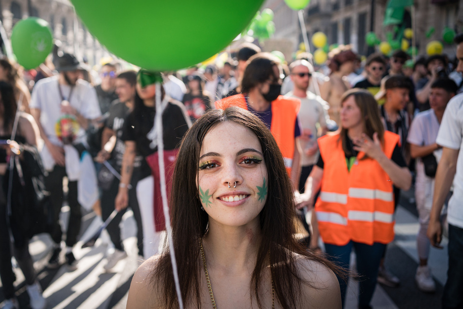 A pro-cannabis protester smiles during a demonstration in the center of Madrid. Thousands of pro-cannabis activists took part in a demonstration in La Gran Via in Madrid, Spain, in favor of legalizing the medicinal and recreational use of marijuana.