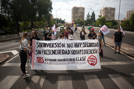 Protesters hold a banner expressing their opinion during the demonstration.
Hundreds of students and teachers took the streets during a general students strike after the reopening of schools and classrooms in Spain called by organizations in defense of public education. Mandatory face masks, social distancing and use of sanitizers are some of measures implemented at schools and universities to prevent the spread of coronavirus (COVID-19), but insufficient according with students and teachers.