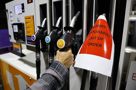 A man is seen using the 91-octane pump near the out-of-stock diesel pump at a fuel station in Melbourne. Fuel prices in Australia remain high amid global market uncertainty linked to the conflict involving the United States and Iran. Rising oil prices and disruptions to international supply routes have contributed to increased costs, while hundreds of petrol stations across the country are reporting shortages and running out of certain fuel types. Prime Minister Anthony Albanese has convened emergency national cabinet meetings and is planning further discussions to address the crisis, as the government works to stabilise supply and manage distribution challenges.