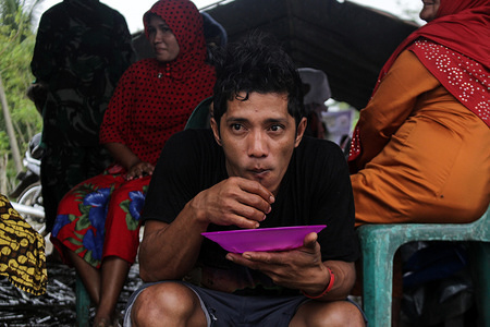 Residents seen occupying a temporary home after being hit by a whirlwind in one of the remote villages in Aceh Utara District.
Heavy rain hit several remote villages in the Aceh Province which severely damaged 13 local houses and injured various village people in Aceh Utara.