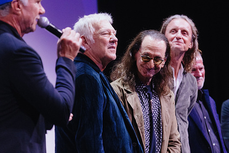 (L-R) Chad Smith, Alex Lifeson, Geddy Lee, Sam Dunn, and Scot McFadyen attend the premiere of "Neil Peart: No One's Disciple" during the Toronto International Film Festival at Princess of Wales Theatre. Geddy Lee and Alex Lifeson of Rush join acclaimed drummers Stewart Copeland, Danny Carey, Chad Smith and Gavin Harrison for a tribute performance honouring late drummer and lyricist Neil Peart and his enduring influence on rock music.