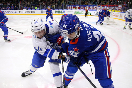SKA Hockey Club player, Mikhail Vorobyov (42) and Dynamo Hockey Club player, Pavel Kudryavtsev (84) seen in action during the Kontinental Hockey League, regular season KHL 2023 - 2024 between SKA Saint Petersburg and Dynamo Moscow at the Ice Sports Palace. 
(Final score; SKA Saint Petersburg 5:3 Dynamo Moscow)