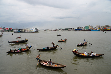 People are seen crossing the Buriganga river by boat in Dhaka.
Dhaka is getting back to its normal life after months of the ongoing Covid-19 pandemic.