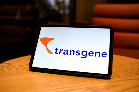 In this photo illustration, the Transgene​ logo is displayed on the screen of a smart tablet.
