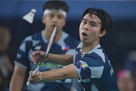 Solomon Padis Jr (front) and Julius Villabrille (back) of Philippines play against Alvin Wijaya of Indonesia and Allen Hsu of Australia (Not in view) during the 2026 ROKETTO Sydney International Men Double Round of 16 match held at Roketto Badminton Centre in Lidcombe. Padis and Villabrille won the match 2-1 (19-21, 21-17, 21-11).