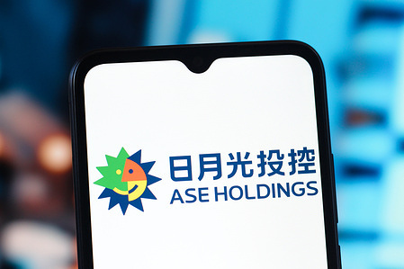 In this photo illustration, the Advanced Semiconductor Engineering (ASE) logo is seen displayed on a smartphone screen.