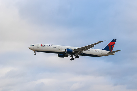Delta Air Lines wide-body Boeing 767-400 airplane with tail number N836MH landing at London Heathrow Airport in the UK. Delta Airlines is the second largest airline carrier in the world measured by fleet size and passenger traffic. The American carrier is member of Sky Team aviation group.