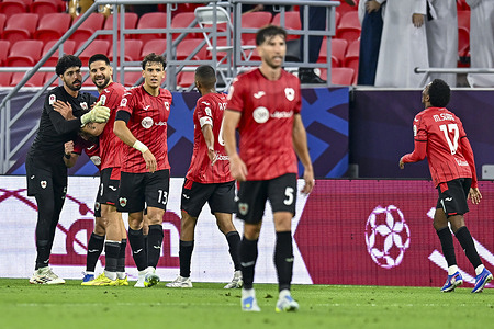 Aleksandar Mitrovic (2nd-L) of Al Rayyan SC celebrates with teammates during the Qatar Stars League match between Al-Rayyan SC and Al-Sadd SC at Ahmad Bin Ali Stadium. Final score; Al Sadd SC 1 : 1 Al-Rayyan SC.