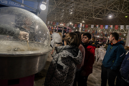 Cotton candy was distributed to the children after iftar. People broke their fast at a 2,500-person iftar dinner held on the first day of Ramadan in Izmir, Turkey.