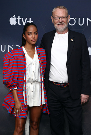 Lou Llobell and Jared Harris attend the Foundation Season Three Photocall at The Croc Bowling Ally inside the Ham Yard Hotel.