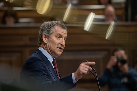 Alberto Núñez Feijóo, leader of the Spanish People's Party and leader of the opposition, attends the plenary session of Congress during the parliamentary session for government oversight.