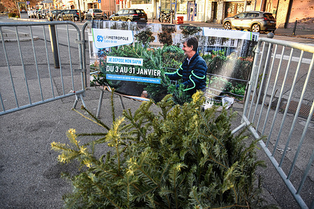 A banner is seen on one of the dedicated areas to collect the used Christmas trees during the holiday to prevent illegal dumping. The Aix-Marseille metropolis has deployed 239 Christmas tree collection points.