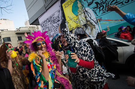 People are seen dancing during the 10th Metaxoureio Carnival.
Thousands of people dressed up to took the streets of Metaxourgeio in Athens for 10th time with Music and dances filled Metaxourgeio from morning until late at night.
