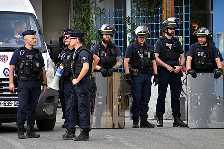 Police on guard during the demonstration. At the call of the environmental movement The Uprisings of the Earth (Les Soulèvements de la Terre in French), people gathered in the Old Port of Marseille when the French President Emmanuel Macron is visiting there for three days as part of the launch of the second part of the government's "Marseille en grand" project.