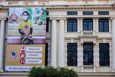 View of a portrait of detained state counselor, Aung San Su Kyi wearing a face mask and encouraging safety during the covid pandemic on the Tourism building near Sule pagoda.
Myanmar's military detained State Counsellor of Myanmar Aung San Suu Kyi and declared a state of emergency while seizing the power in the country for a year after losing the election against the National League for Democracy (NLD).