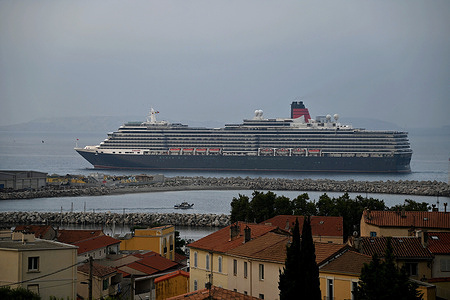 View of the Queen Victoria arriving in Marseille. The passenger cruise ship Queen Victoria arrives at the French Mediterranean port of Marseille.