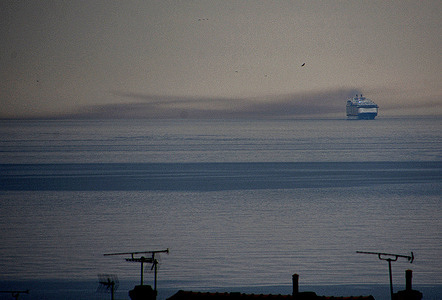 The liner Wonder Of The Seas cruise ship arrives at the French Mediterranean port of Marseille, spitting out an impressive cloud of smoke.