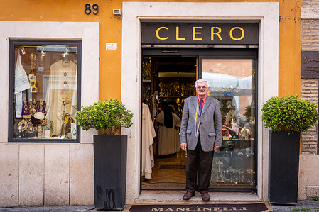Italian tailor, Raniero Mancinelli stands outside his shop in Rome. Raniero Mancinelli, 86, has personally handcrafted the cassocks for three Popes.