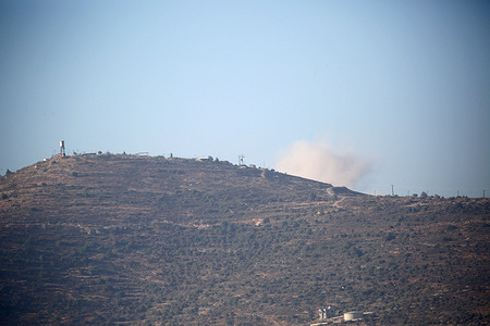 Smoke rises from the Israeli settlement of Itamar in the West Bank, near Nablus, after missiles were launched from Iran toward Israel. Sirens sounded in several areas of northern Israel, Jerusalem, and Jewish settlements in the West Bank following the missile attack from the Islamic capital, Iran.