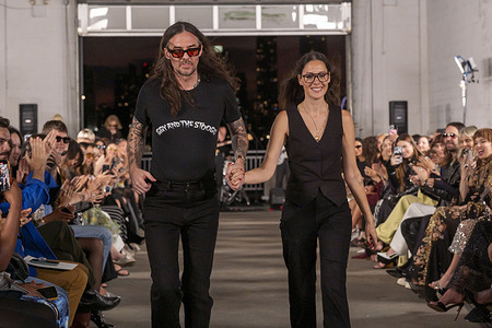 Designers Anthony Cucculelli and Anna Rose Shaheen walk the runway finale for the Cucculelli Shaheen fashion show during Spring 2026 New York Fashion Week at Pier 40 in New York City.