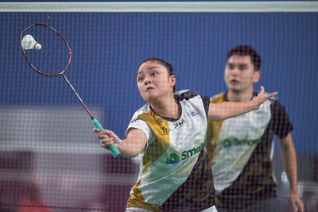 Christian Bernardo (R) and Eleanor Christine Inlayo (L) of Philippines seen in action during the Mixed Doubles Round of 16 match against Edward Lau and Shaunna Li of New Zealand (not in the photo) at the ROKETTO Sydney International 2024 held at the Roketto Badminton Centre, Lidcombe. Bernardo and Inlayo lost the match, 1-2 (13-21, 21-18, 16-21)