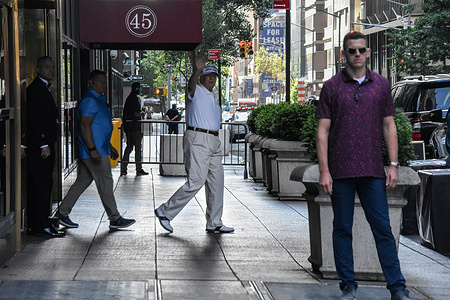 Former President of the United States Donald J. Trump waves to a crowd outside Trump Tower. Former President of the United States Donald J. Trump departs Trump Tower in Manhattan, New York on Memorial Day morning, 9:12 AM EST, May 29, 2023, to play golf. Former President of the United States Donald J. Trump waved to the crowd outside Trump Tower prior to his departure.