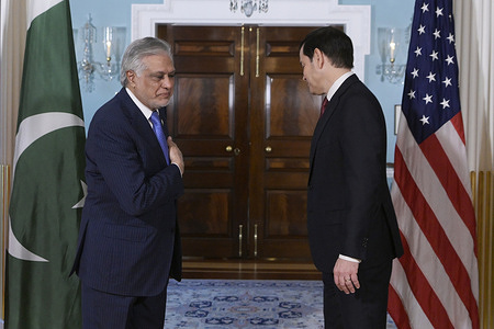 US Department of State Secretary Marco Rubio and Pakistani Foreign Minister Ishaq Dar arrive to take a spray photo opp before hold a Bilateral Meeting, at Treaty Room/State Department in Washington DC, USA.