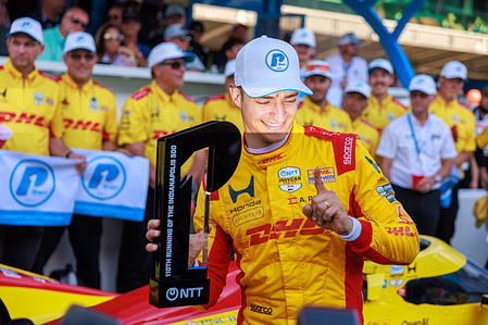 Chip Ganassi driver Alex Palou (10) celebrates winning the pole position during qualifications for the Indy 500. Drivers were competing for their place in the line up of 33 cars that will start the race.
