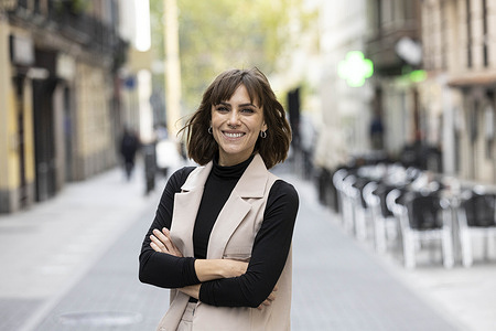 Aura Garrido poses for a portrait session at 'Ocho y Medio' bookstore in Madrid.