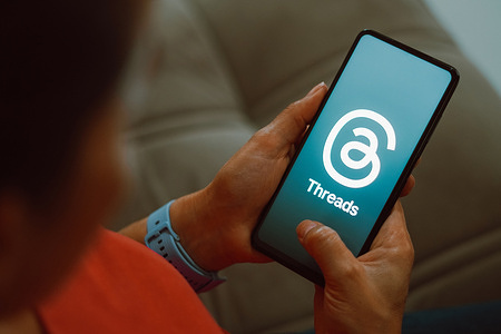 In this photo illustration, the app Threads from Meta seen displayed on a mobile phone. 
Threads is the latest app launched by Meta. The Threads app is the direct rival of Twitter