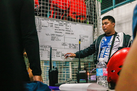 Rescue workers discuss the situation during Super Typhoon Noru (locally named Karding). After the death of 5 rescuers in Bulacan Province during the peak of Super Typhoon Noru (locally named Karding), Philippine Senate proposed to grant regularization to the rescuers working as casual and contractual workers. Disaster experts say that some rescue workers reported that they didn't have good benefits, equipment, and training for their field.