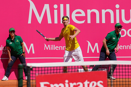 Mate Valkusz from Hungary returns a ball during the Millennium Estoril Open second qualifying round ATP 250 tennis tournament at the Clube de Tenis do Estoril.Final score: Henrique Rocha 2:0 Mate Valkusz
