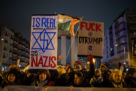 Protesters raise placards during a pro-Palestinian. Pro-Palestinian activists held a rally ahead of the game between Maccabi Tel Aviv and Real Madrid for the Turkish Airlines Euroleague, around one hundred people protested against the game being played without spectators in front of the Palacio de los Deportes (Movistar Arena) in Madrid.