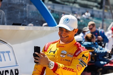 Alex Palou makes a selfie video after winning the pole during qualifying for the Sonsio Grand Prix at Indianapolis Motor Speedway. The race is part of the Month of May schedule leading into the Indianapolis 500.