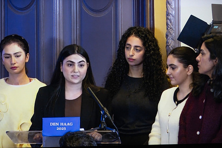 Nahal Safa, representing the Iranian Dutch Youth Association, speaks about her family's experience with repression, recalling her uncle's execution and noting that many political prisoners in Iran rest in unmarked graves. A human rights conference marking the International Day for the Elimination of Violence Against Women gathered Dutch senators, European dignitaries, UN experts, and Iranian associations to address the surge in executions targeting women and political prisoners in Iran. Organized by FOFI-NL and the Union of Iranian Associations, the event featured an online keynote by Maryam Rajavi, urging Europe to condition relations with Tehran on halting executions and blacklisting the IRGC.